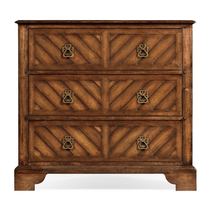 Walnut parquet chest of three drawers