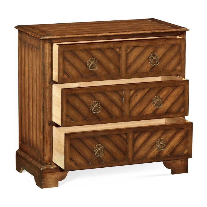 Walnut parquet chest of three drawers