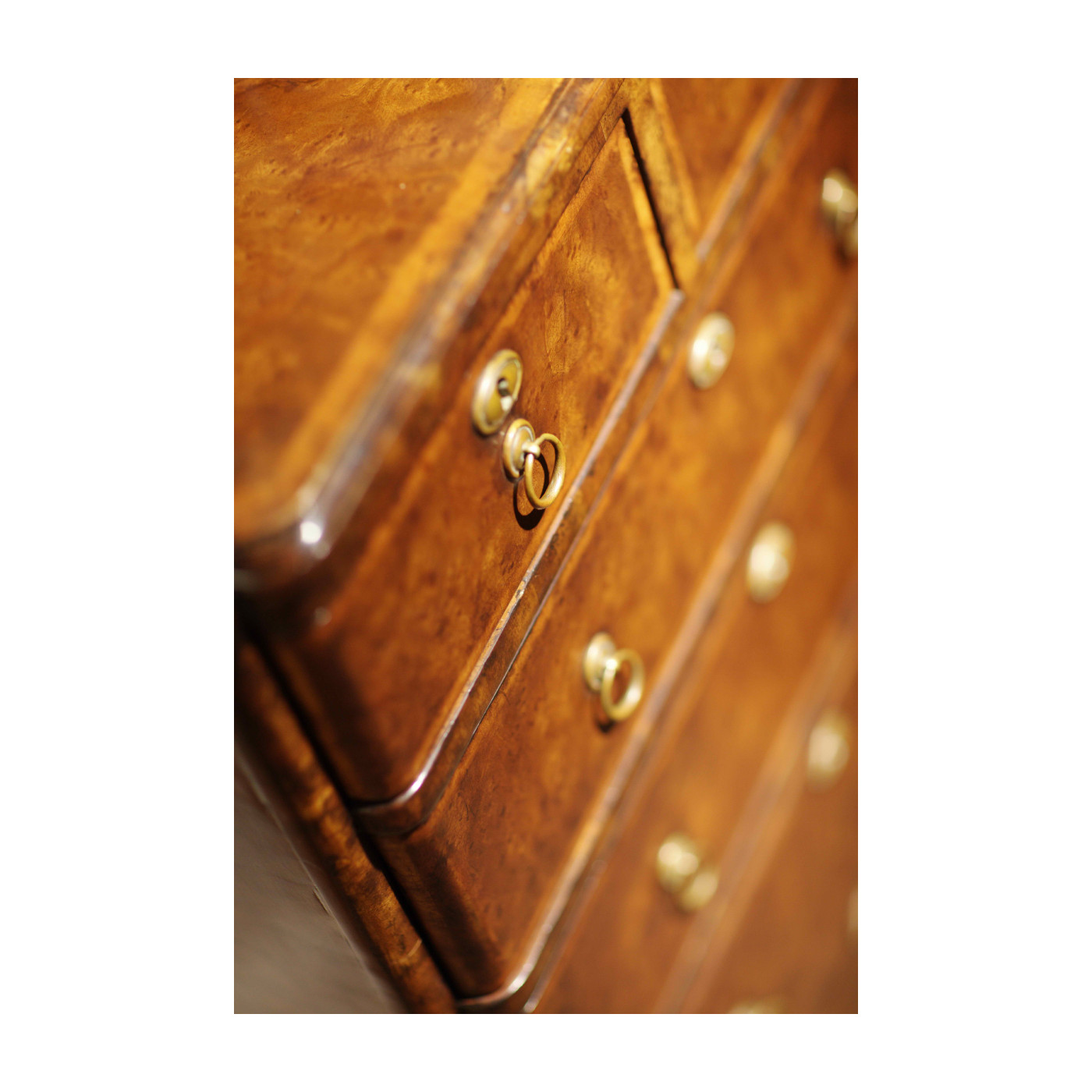 Bow front walnut chest of six drawers