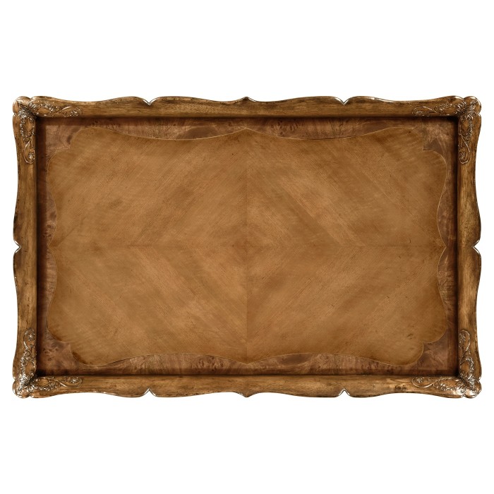 Rectangular satinwood coffee table with carved raised top