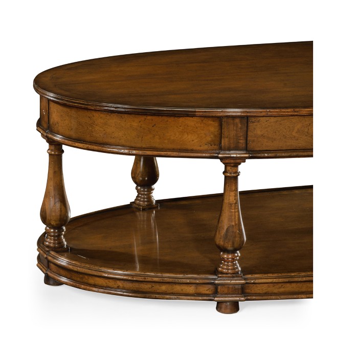 Large oval walnut coffee table