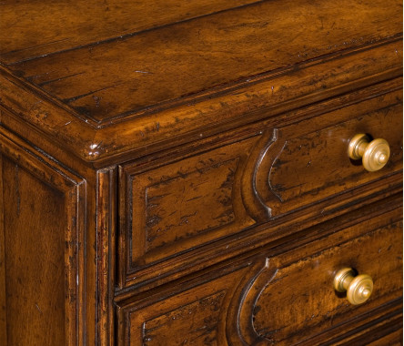 Tudor style walnut chest of four drawers
