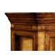 Raised veneer glazed cabinet with cupboards
