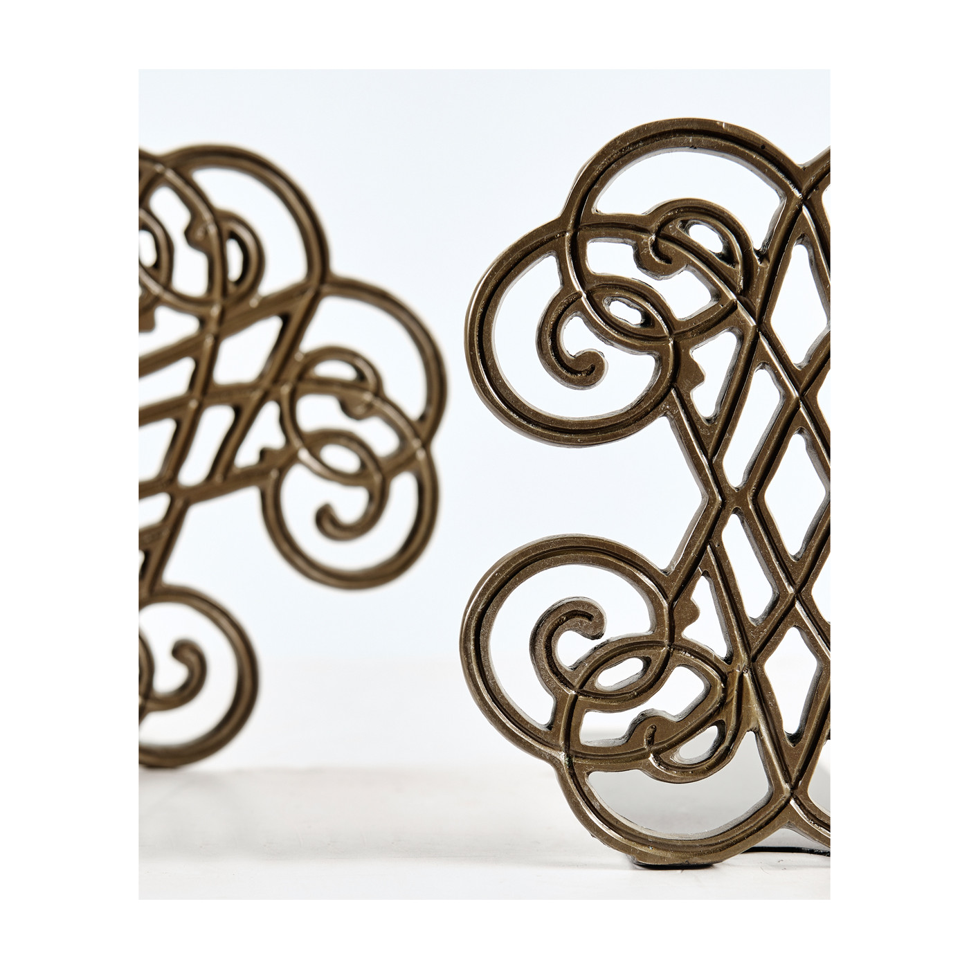 Pair of Patinated Brass Bookends