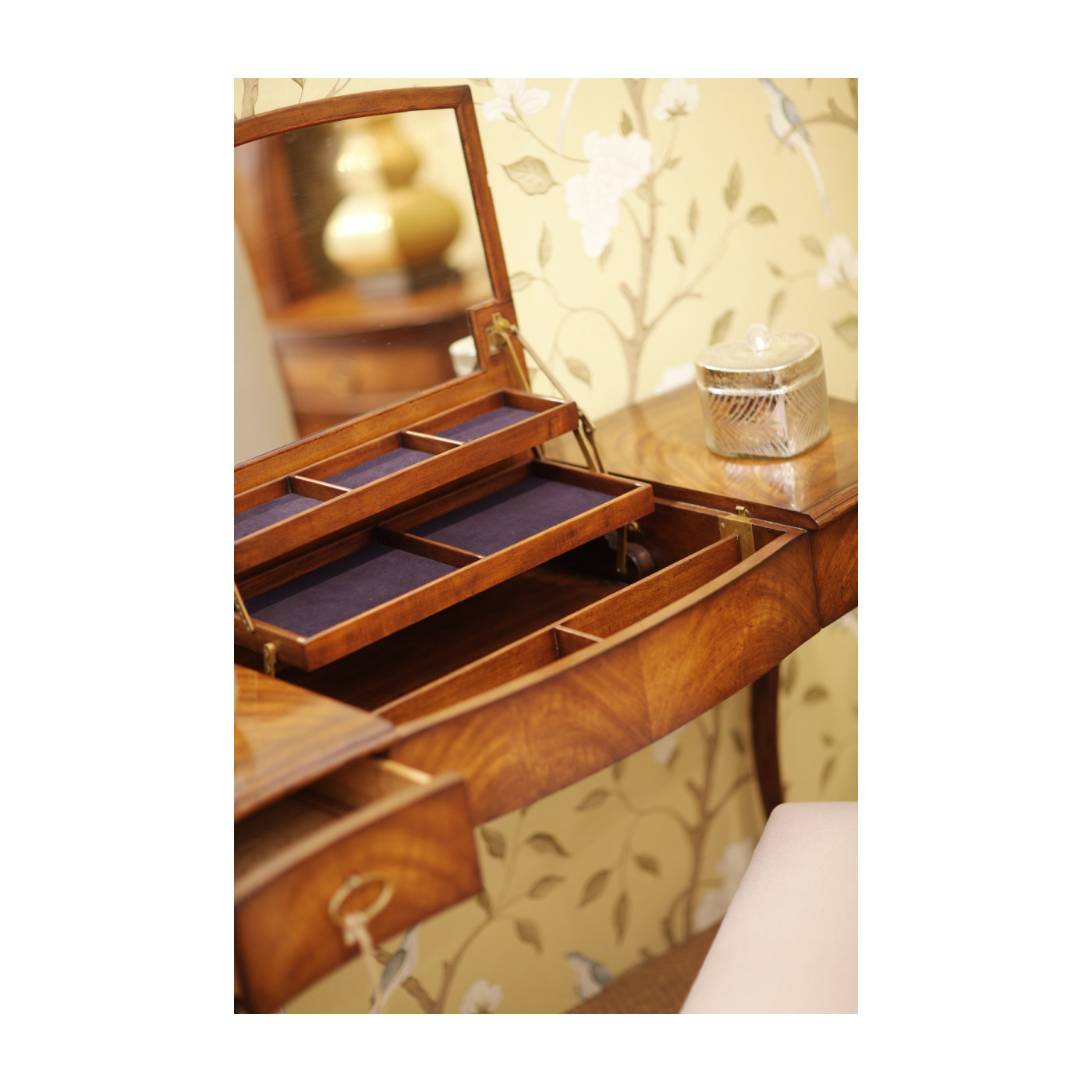 Dressing table with hinged mirror