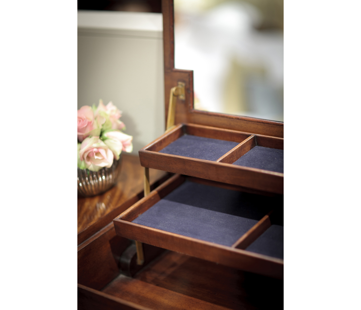 Dressing table with hinged mirror