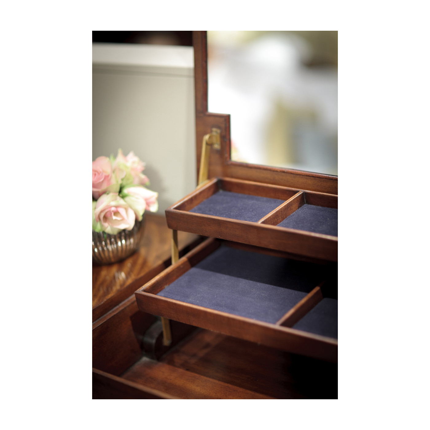 Dressing table with hinged mirror