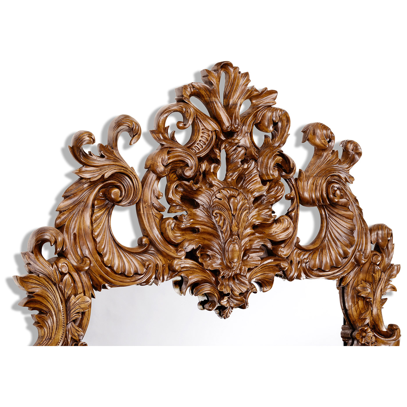 Finely carved walnut rococo style mirror