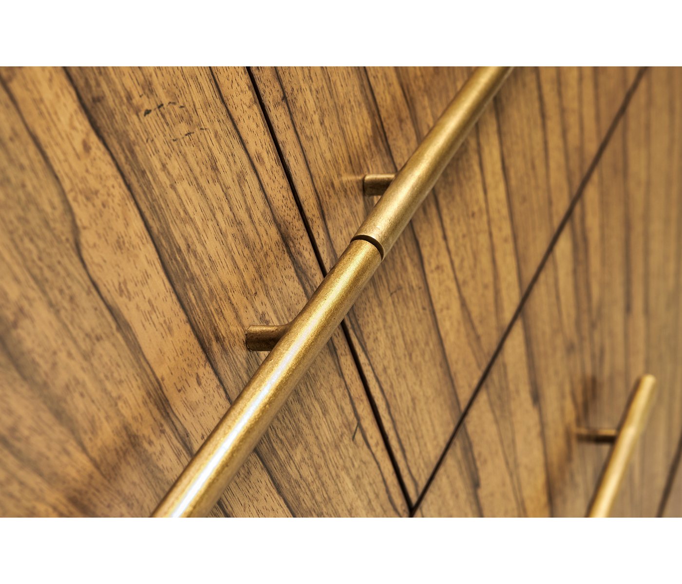 Argentinian walnut veneered tapering chest of drawers