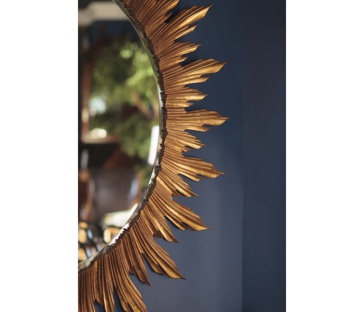 Large silver sunburst mirror