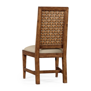 Rustic walnut upholstered side chair with lattice back
