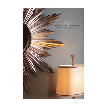 Small silver sunburst mirror