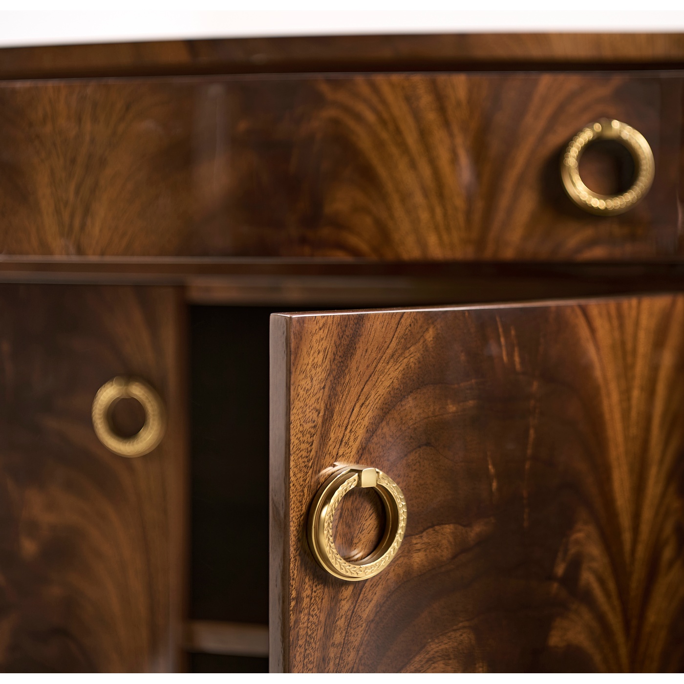 Serpentine antique brown mahogany sideboard with four doors