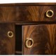 Serpentine antique brown mahogany sideboard with four doors