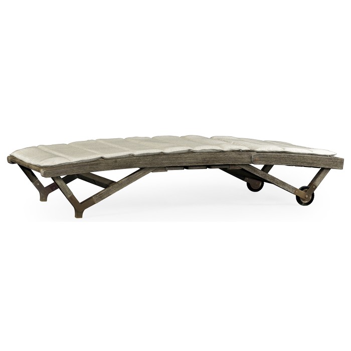 Grey Chaise Lounge on Wheels with a Retractable Drink Holder & Cushion